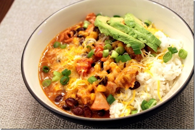 These Crockpot Cheesy Chicken Enchilada Rice Bowls are perfect for busy weeknights. They come together in no time, AND they’re full of flavor!